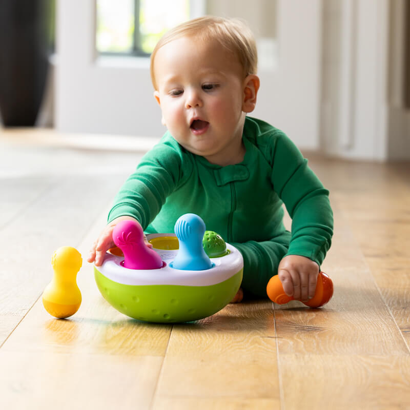 Child having fun playing with Spinny Pins!