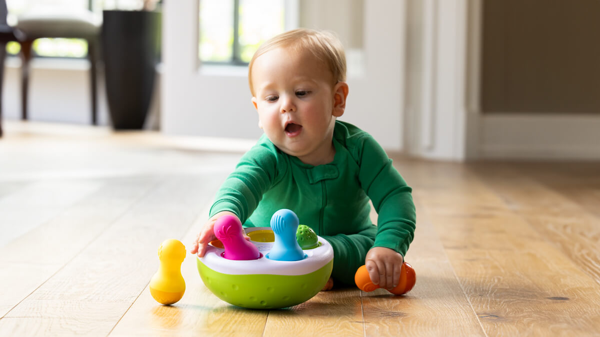 Child having fun playing with Spinny Pins!